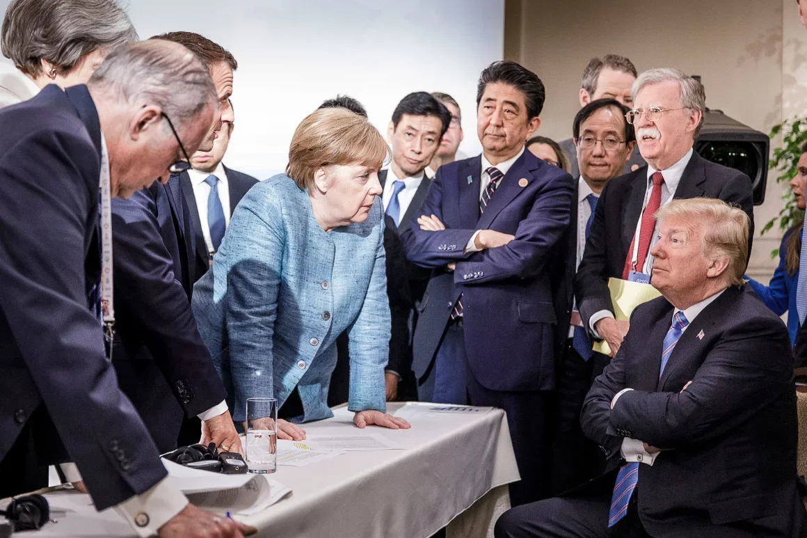 Angela Merkel y Donald Trump en la cumbre del G7 de 2018